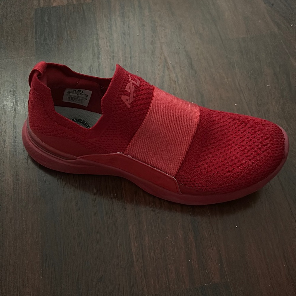 Red APL shoes slide on